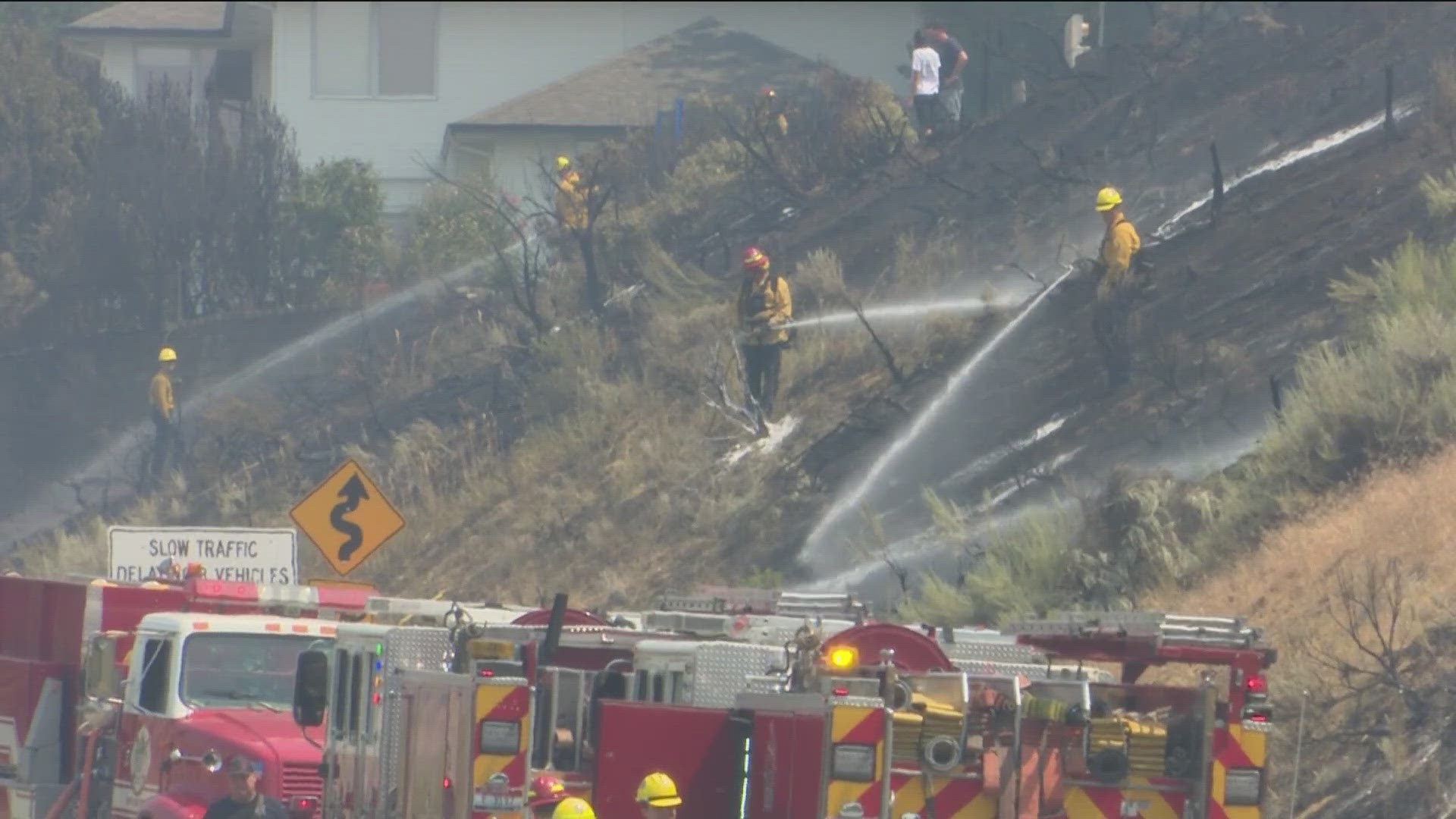 The brush fire is contained after burning roughly 2 acres and threatening about 12 homes in the area near Bogus Basin Road.