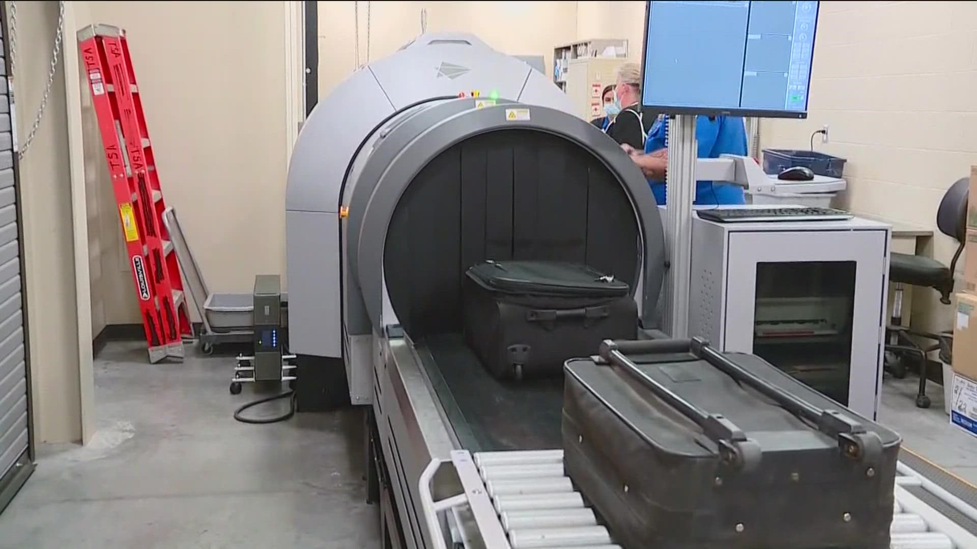 TSA officials hosted a first-hand look at the new computed tomography scanner, which will now automate all checked baggage screening operations.