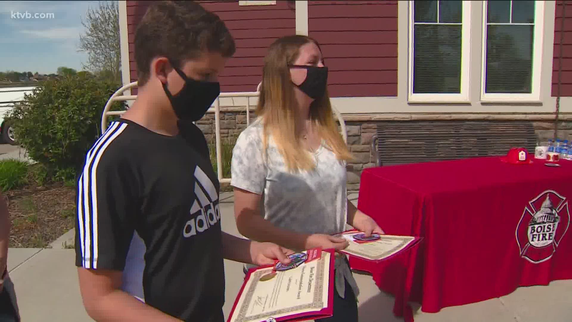 The Boise Fire Department presented awards to 13-year-old Caleb Joramo and his sister, 16-year-old Ashley Joramo during a ceremony Friday.