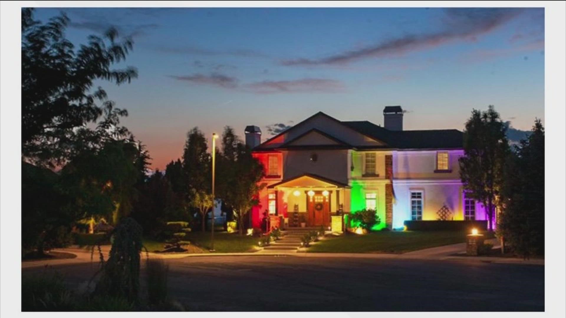 Hall put up the display toward the end of Pride Month in June, but on July 8, his homeowner's association sent a letter giving him 48 hours to take the lights down.