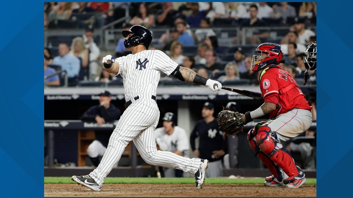 Gleyber Torres of the New York Yankees follows through on his seventh