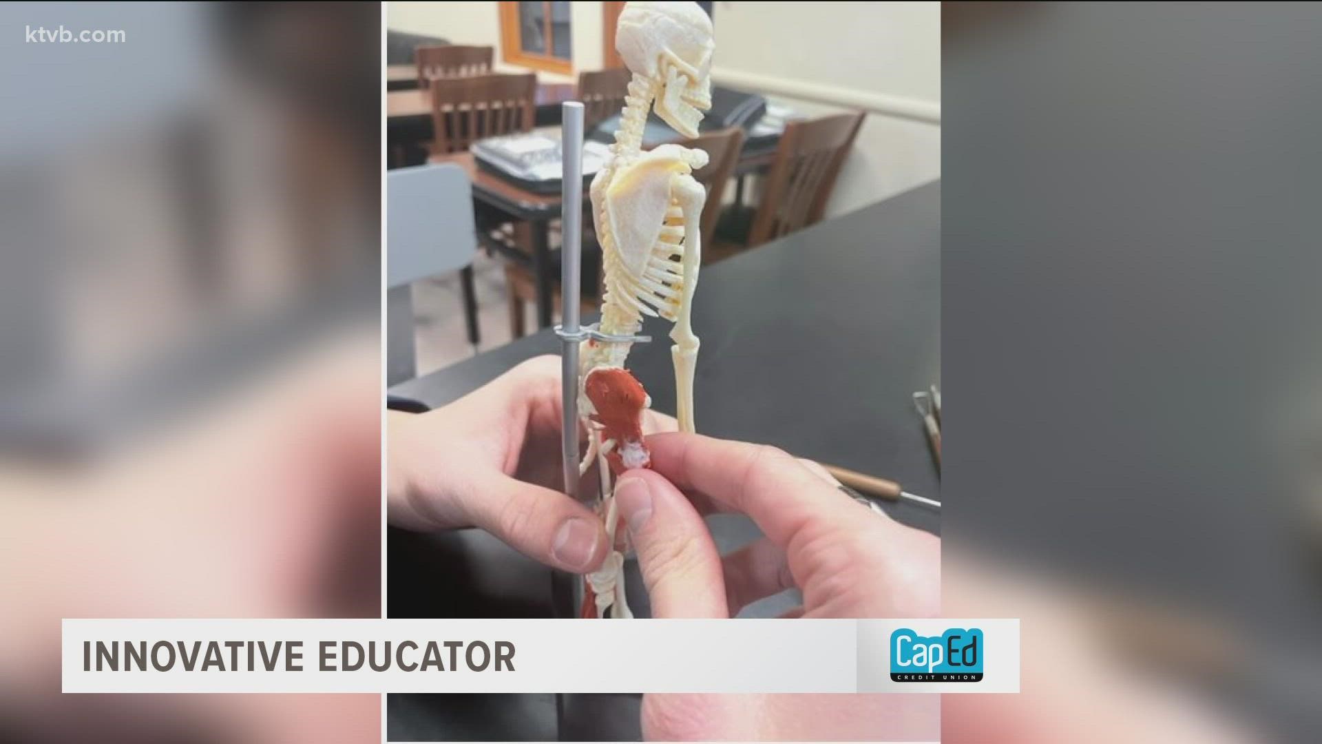 Ken Hosier uses mini skeleton models, clay and sculpting tools to teach his biology students how the body moves.