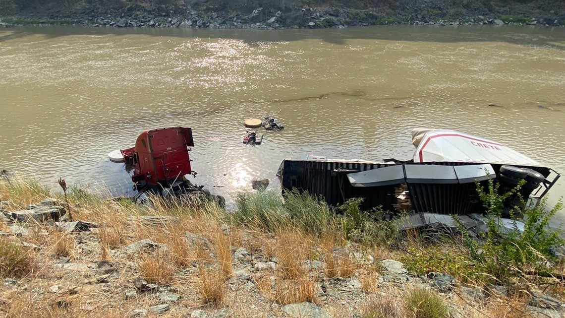 Trucker survives after semi plunges into Salmon River
