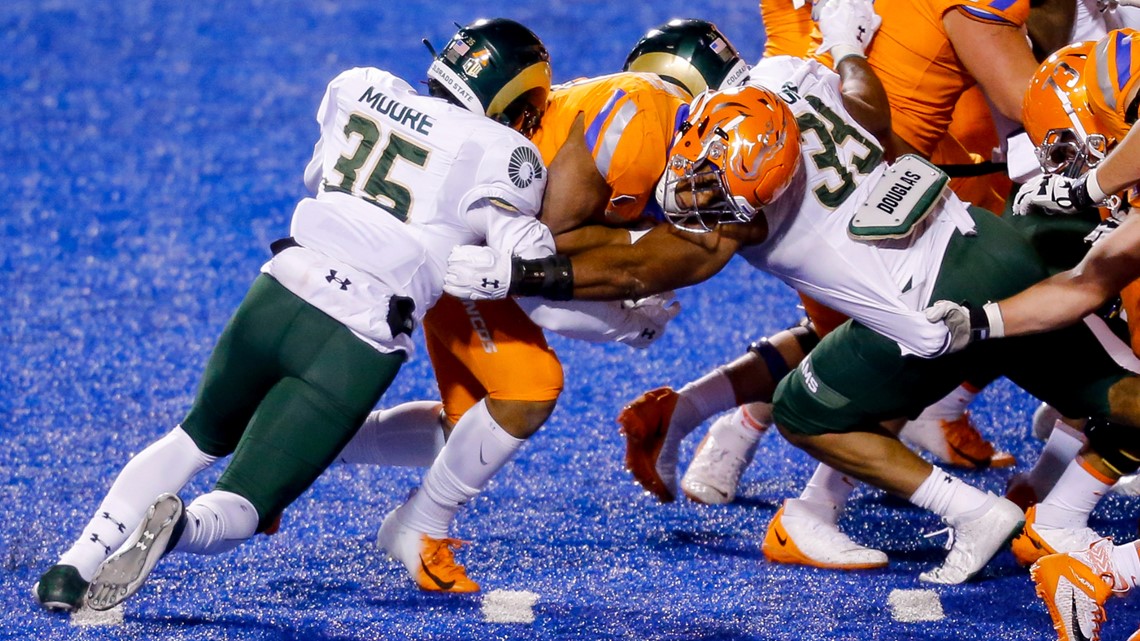 BOISE, ID - NOVEMBER 12: Boise State Broncos safety Tyreque Jones (21)  smiles during a college football game between the Wyoming Cowboys and the  Boise State Broncos on November 12, 2021, at