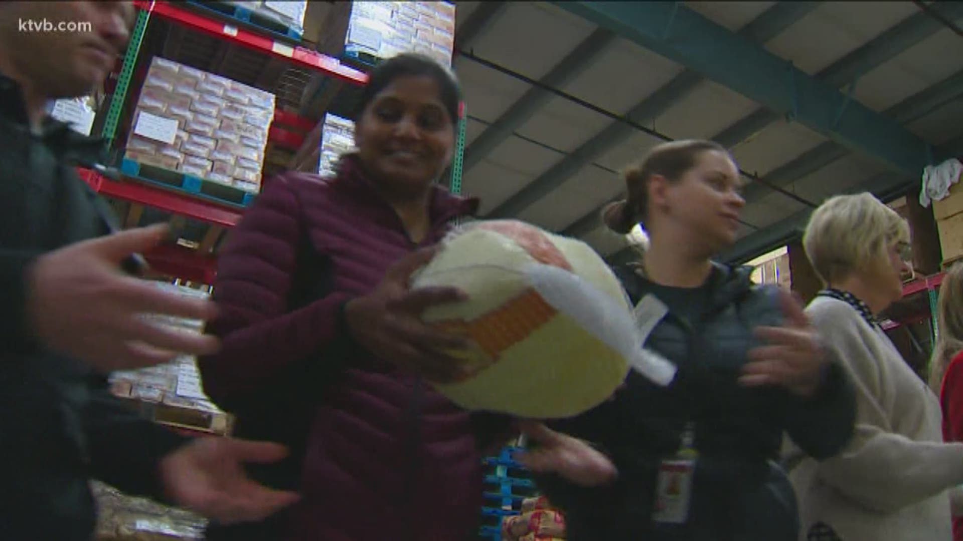 They gave nearly 1,700 turkeys and hams to the foodbank Tuesday.