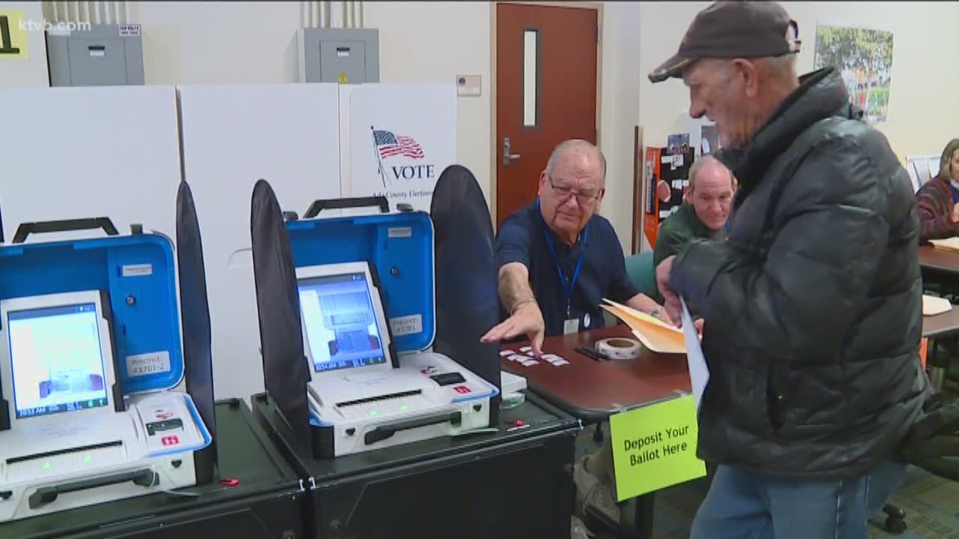 The law says you must keep 100 feet away from where people are voting.