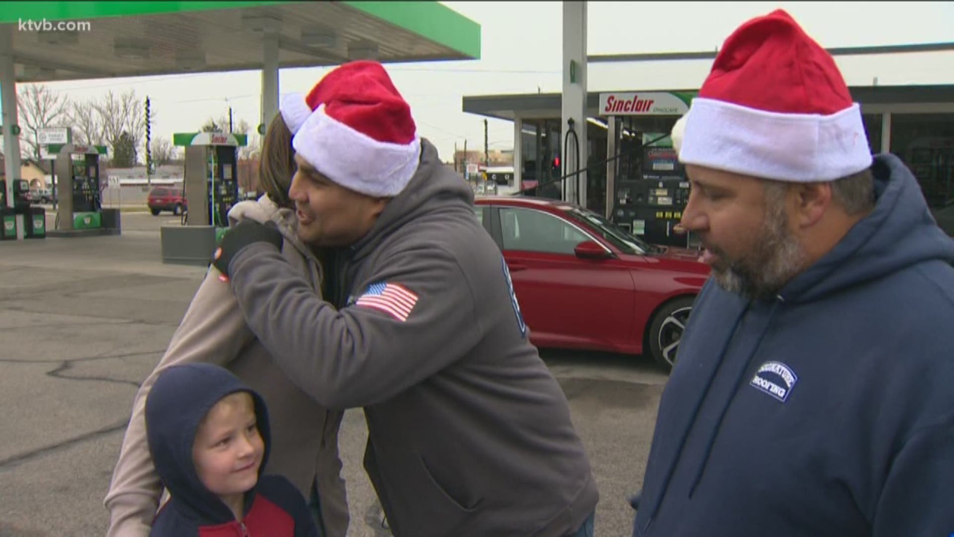 Roofing company gives out free gas to single parents
