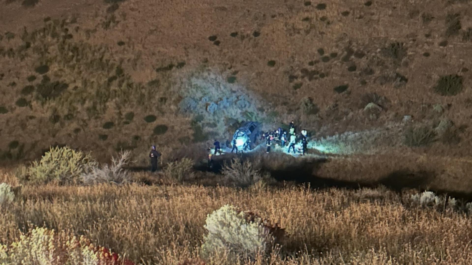 Two rescued from vehicle after rolling 120 yards in Boise Foothills Boise firefighters rescued two people after a vehicle rolled roughly 120 yards down a hill following a crash early Tuesday morning.