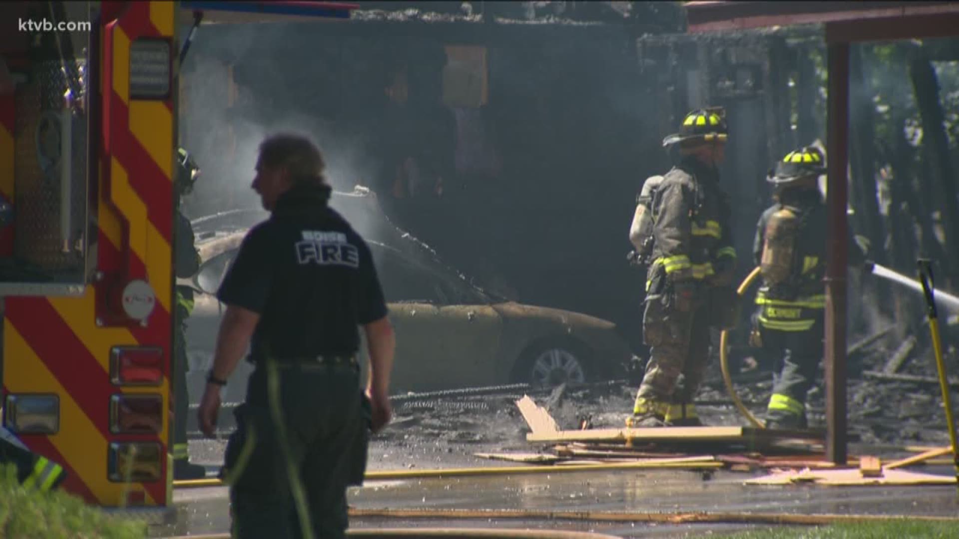 The blaze broke out just before noon at a complex on Garfield Street.