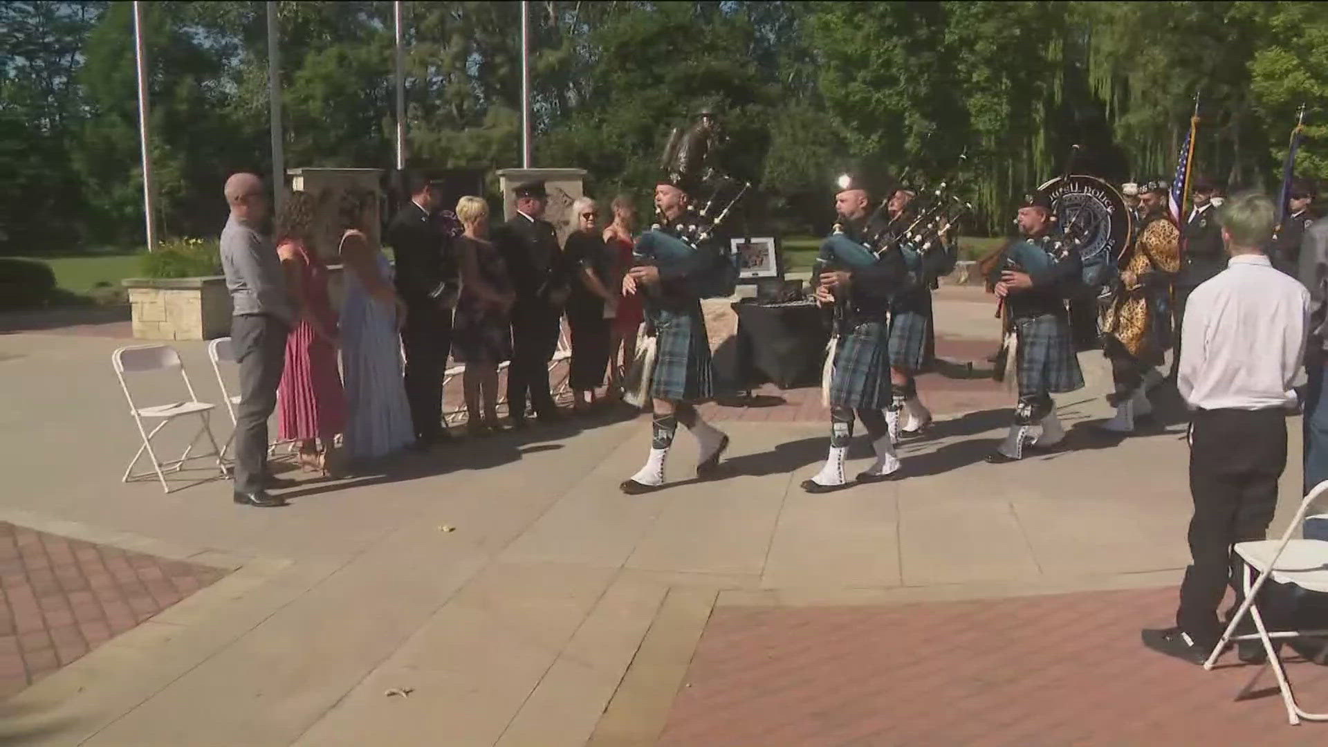 People paid their respects to fallen firefighters. 