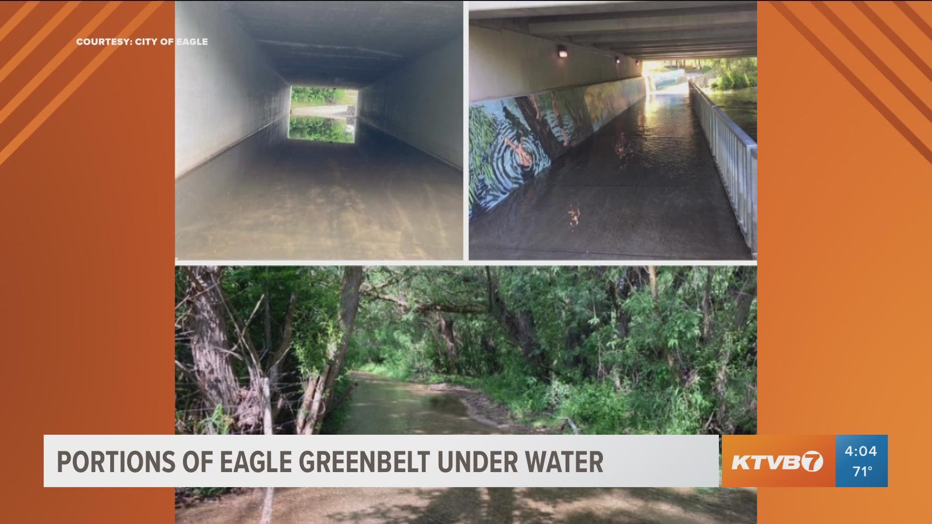 Three Eagle Greenbelt trails are underwater Wednesday morning due to recent rain and high river flows.