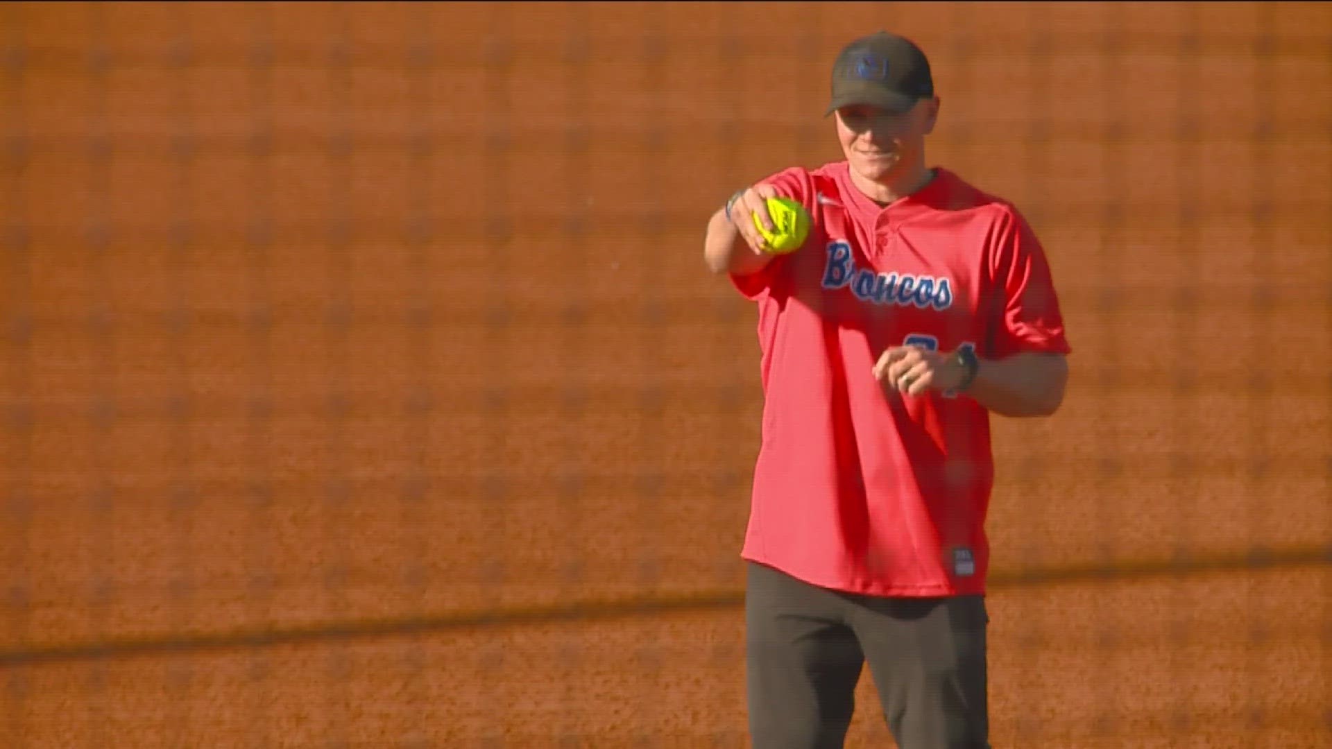 Danielson went all in with the underhand pitch, but the location – a bit of a problem. The Bronco head coach rocked the scripted orange jersey at Dona Larsen Park.