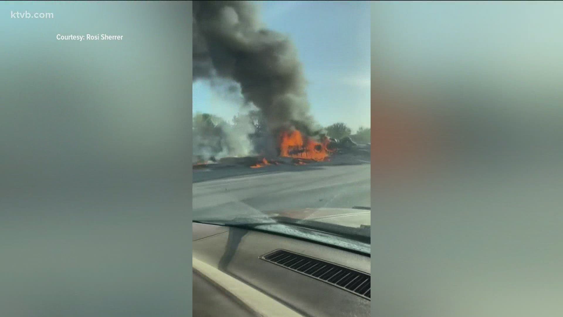 At least two semis were involved. One crashed into the median and burst into flames.