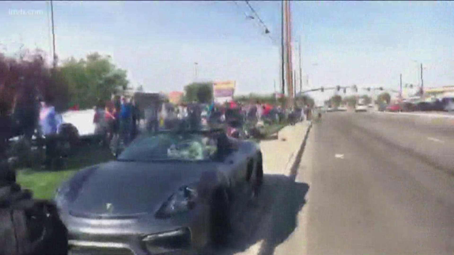 The man lost control of his Porsche and went onto a sidewalk and into a crowd.