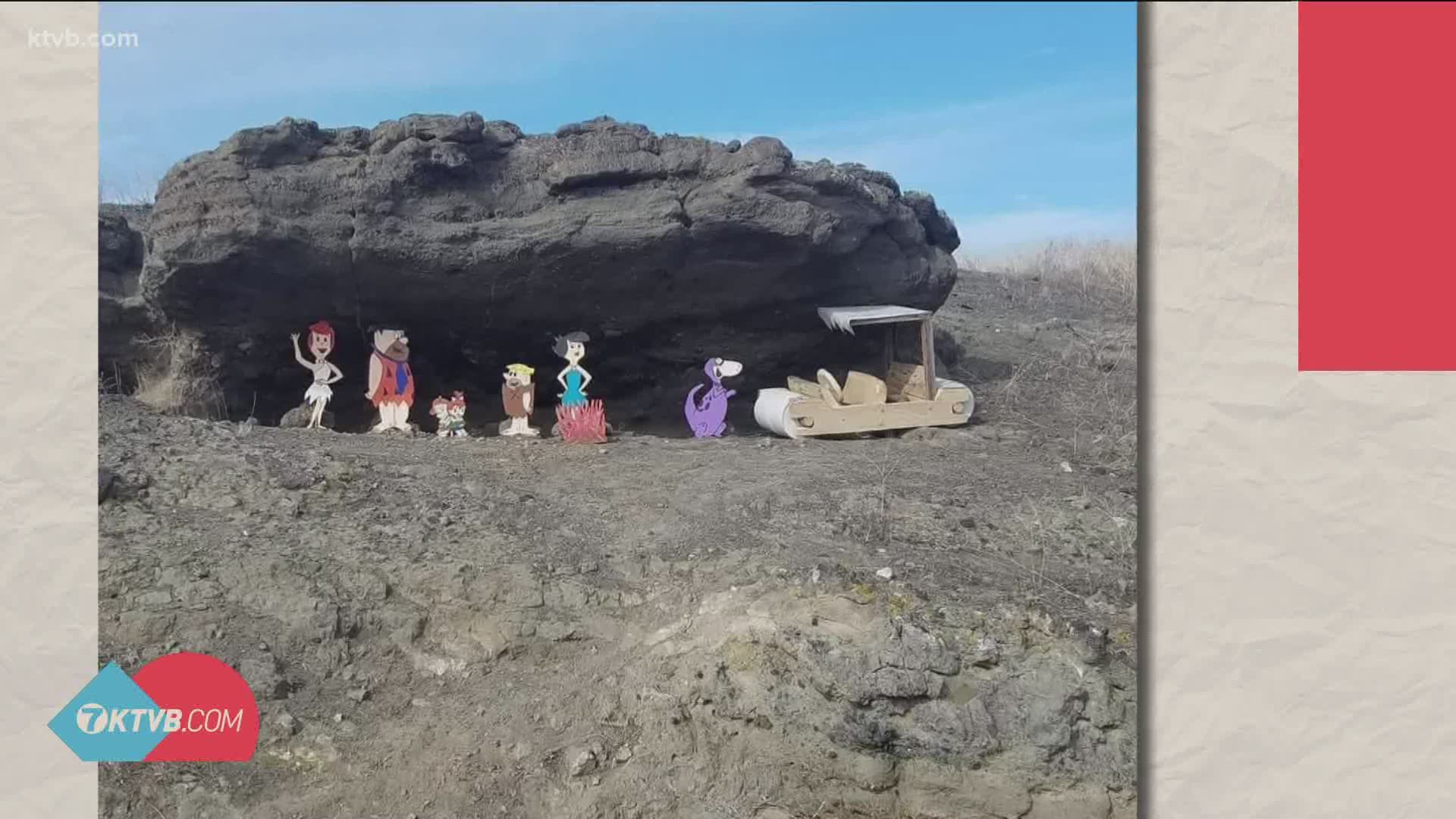 Ginny Wooley wanted to make people smile went she put the Flintstones characters under a rock overhang along Highway 167 between Mountain Home and Grandview.