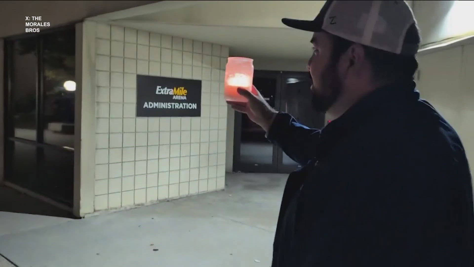 The Morales brothers, both diehard Bronco fans, held a midnight candlelight vigil outside ExtraMile Arena to clear the energy after Boise State's stunning loss.