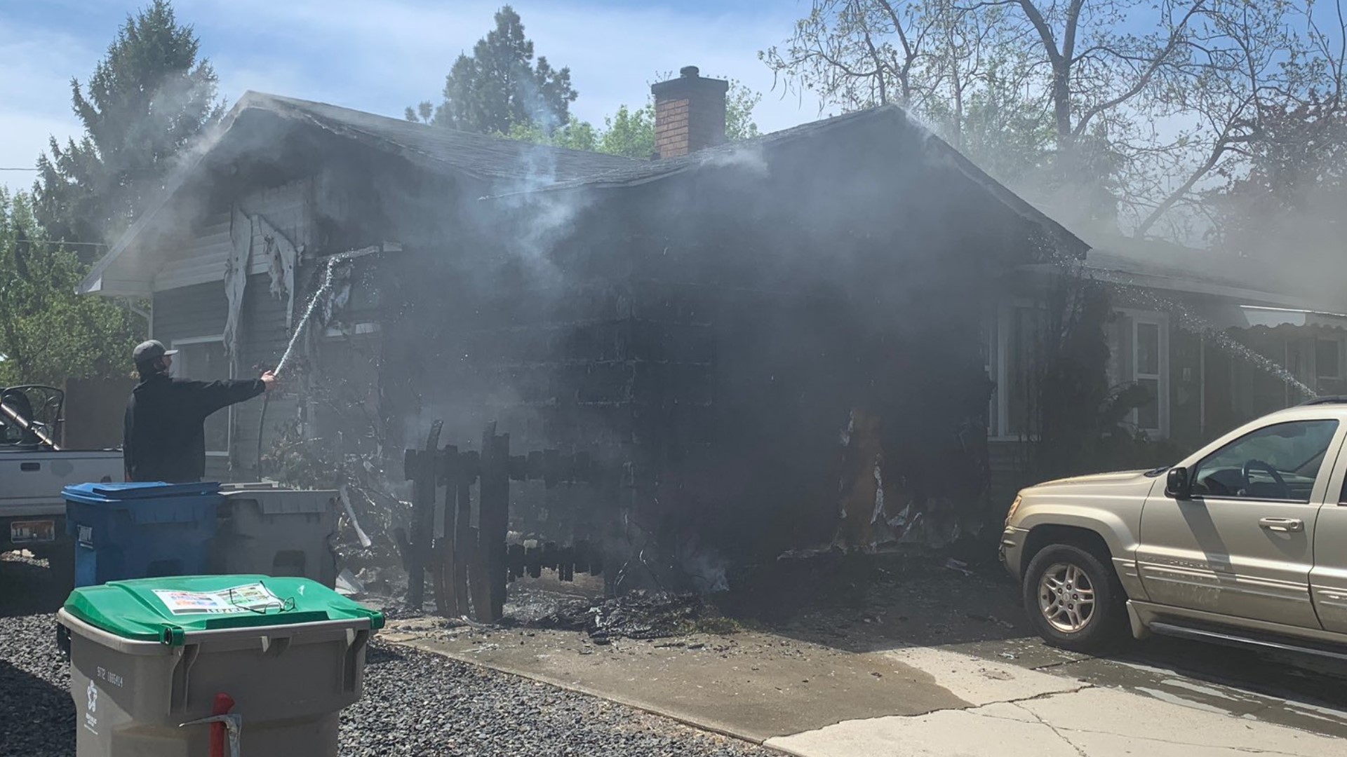 Crews battle house fire on Boise Bench