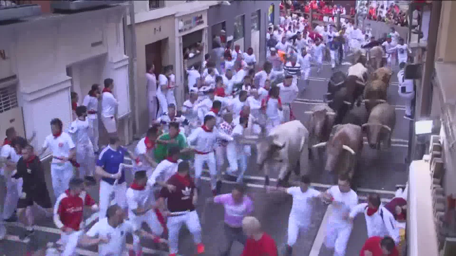 The first Running of the Bulls in three years is underway. It's part of the San Fermin Festival.