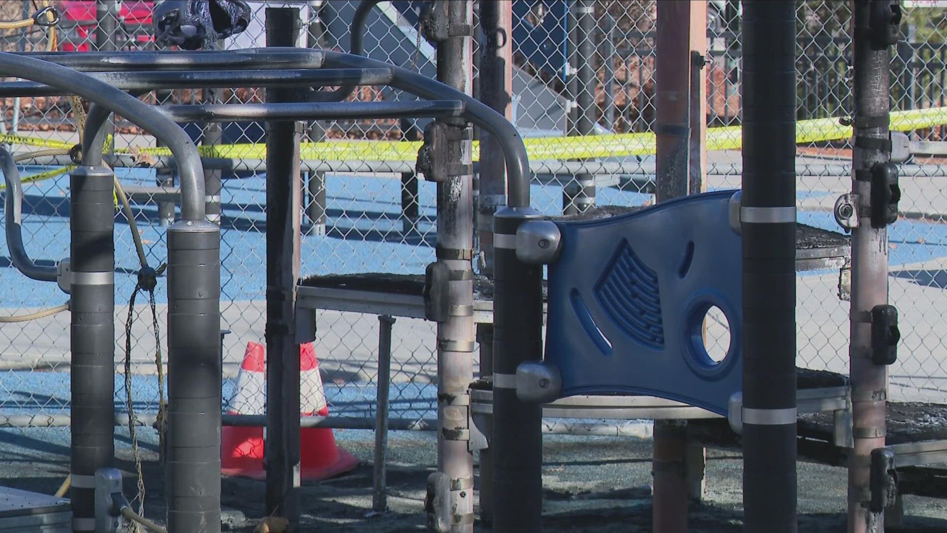 Police said two minors were arrested Tuesday after a suspected arson fire devastated a Garden City playground used by 400 children daily.