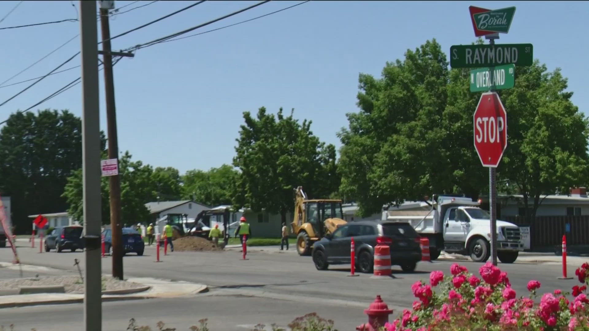 Emergency crews have closed Overland Road due to air quality concerns, with police monitoring levels for safety.