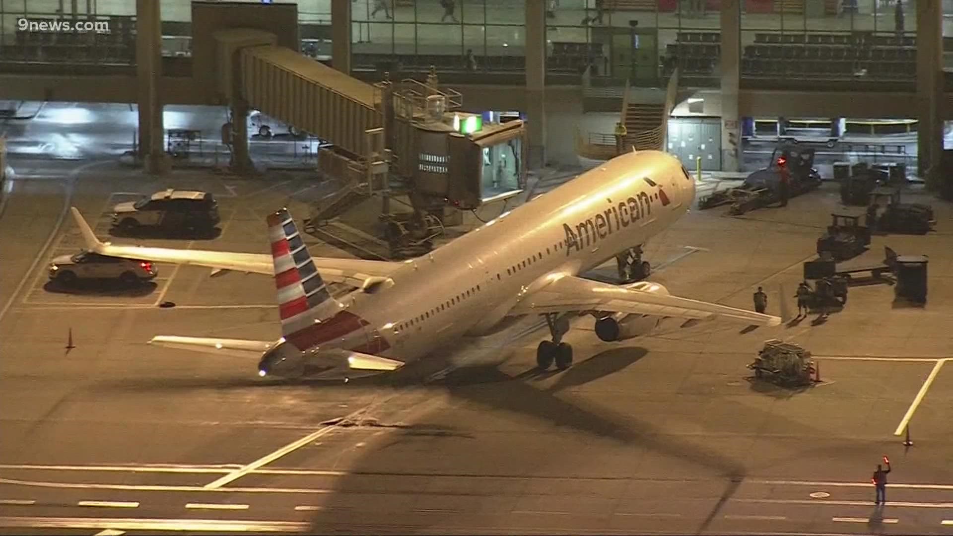 A flight from New York to California was diverted to Denver after a passenger physically assaulted a flight attendant, according to American Airlines.