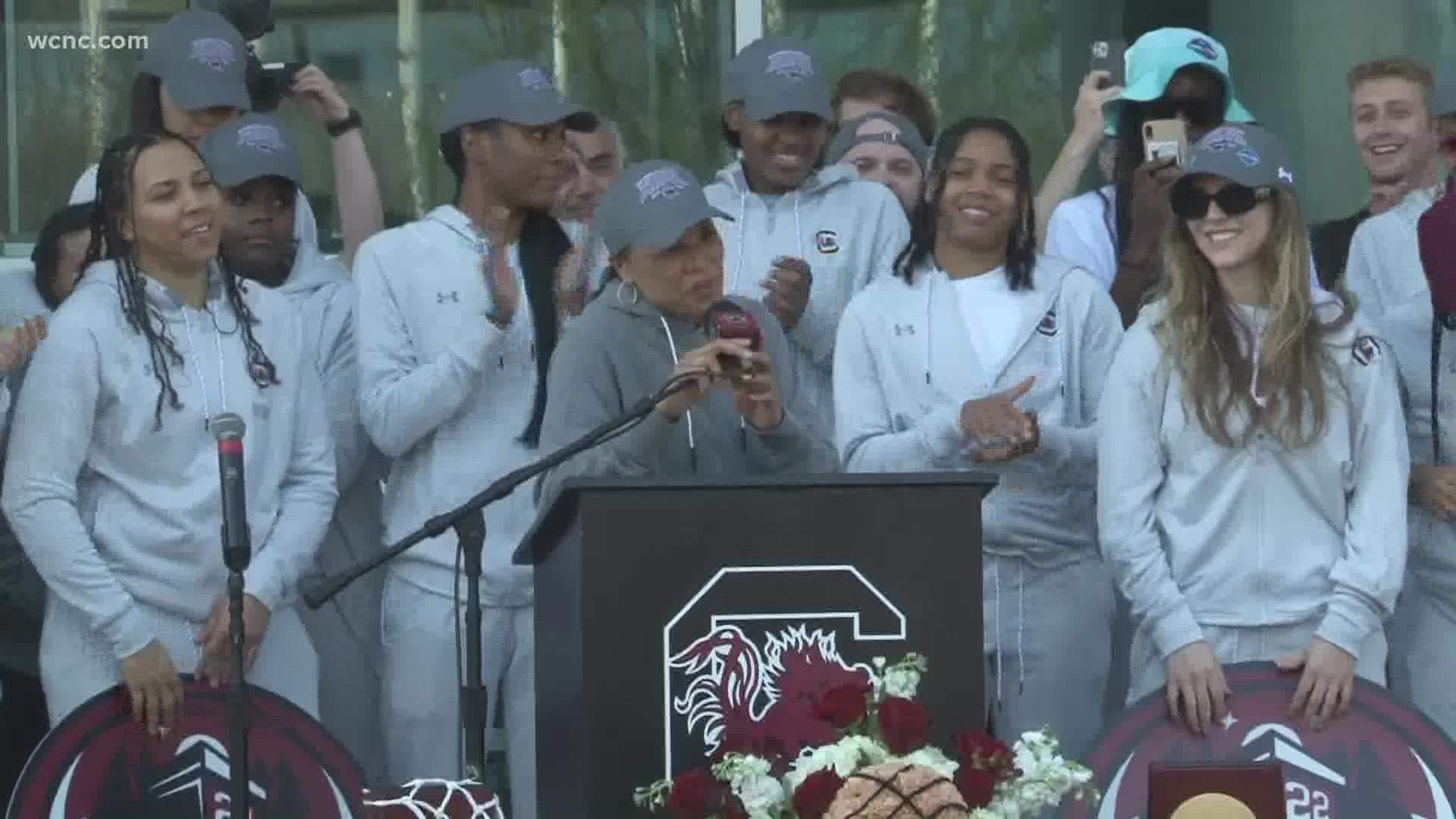 Fans have gathered outside Colonial Life Arena in Columbia Monday to welcome home the NCAA National Champions.