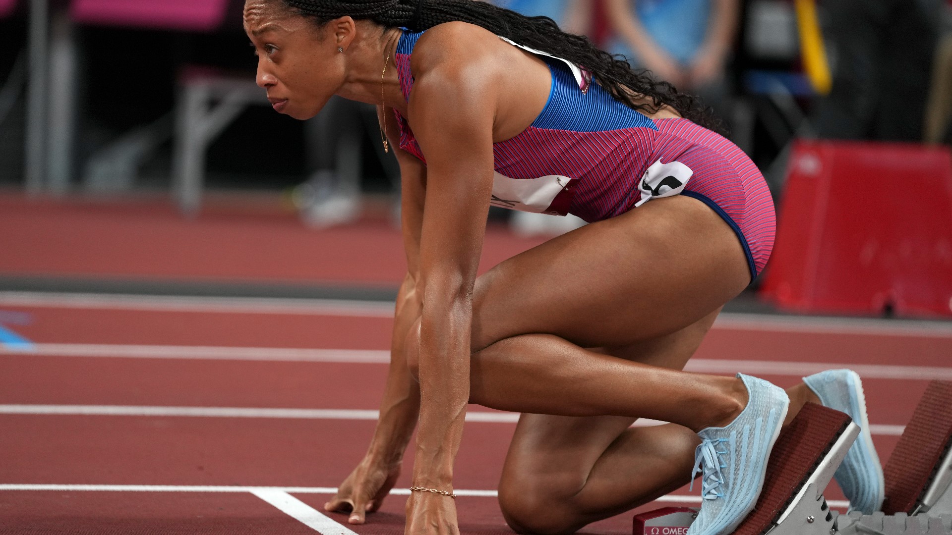 The American sprinting champion became the most decorated woman in track and field when she won the 400 meter bronze in her own shoe brand 'Saysh.'